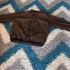 A Footjoys Dryjoy rain jacket